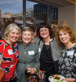 Four female partygoers at the Washington, D.C., holiday get-together